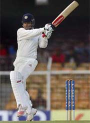 Virender Sehwag hits a shot during the fourth day of the first Test against Sri Lanka in Chennai