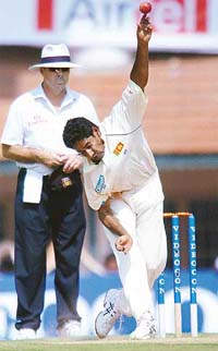 Chaminda Vaas of Sri Lanka bowls during the fifth day of the first Test against India in Chennai