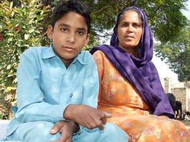 13-year-old Gurvinder Singh with his mother at his house in Gehri Buttar on Friday