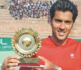 Aisam Qureshi of Pakistan holds the trophy after winning the singles event of the $10,000 Microsoft ITF Men�s Futures tennis meet at the CLTA Stadium, Sector 10, Chandigarh, on Friday