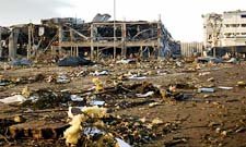 The damage done to the area near the Buncefield oil depot near the town of Hemel Hempstead, around 40 km northwest of London, after a series of explosions there on Sunday