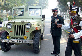 Commanding Officer Col Ashutosh Kale alights from the jeep that 3 Grenadiers had captured from 35 Frontier Force of Pakistan during the 1971 Indo-Pak war, at Bathinda Cantt on Friday. 