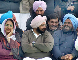 The Chief Minister, Capt Amarinder Singh, and the PPCC chief, Mr Shamsher Singh Dullo, share a laugh at the party’s first electoral rally in Lambi on Saturday.