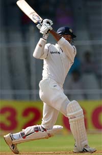Irfan Pathan hits a shot during the second day of the third Test against Sri Lanka in Ahmedabad