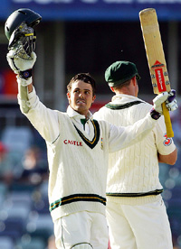 South Africa�s Jacques Rudolph celebrates reaching his century during the fifth day of the first Test against Australia in Perth on Tuesday
