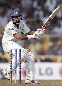 Yuvraj Singh hits a shot during the third day of the third Test between India and Sri Lanka in Ahmedabad on Tuesday