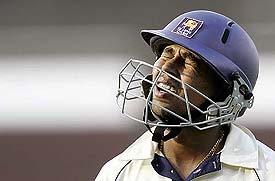 Sri Lanka�s Tillakaratne Dilshan reacts after his dismissal during the fourth day of the third Test match between India and Sri Lanka in Ahmedabad on Wednesday