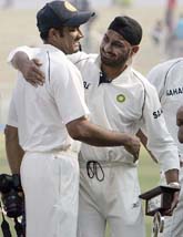Man of the Match Harbhajan Singh hugs teammate and Man of the Series Anil Kumble following India's victory over Sri Lanka in Ahmedabad on Thursday.