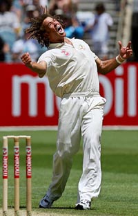 Australia�s Andrew Symonds celebrates after taking the wicket of South Africa�s Mark Boucher during the third day of the second Test in Melbourne