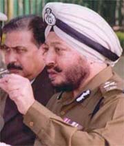 The Director-General of Police, Punjab, Mr S.S. Virk, explains a point at a press conference in Chandigarh