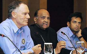 BCCI President Sharad Pawar is flanked by Rahul Dravid and Greg Chappell as he addresses media representatives at a press conference in New Delhi on Thursday