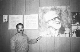 Suresh Kumar explains about the late Dr Salim Ali, a renowned ornithologist, to tourists at the Sultanpur National Park, near Gurgaon