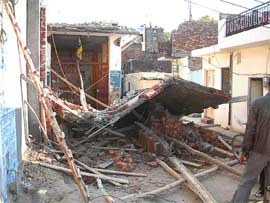 A view of the demolished portion of a temple near Lohgarh Gate in Amritsar.
