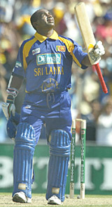 Sanath Jayasuriya celebrates on completing his century during a one-day match against Australia at the Sydney Cricket Ground on Sunday.
