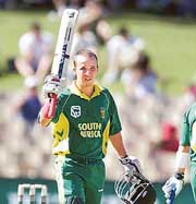 Boeta Dippenaar celebrates after completing his century. 