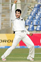 Sourav Ganguly celebrates the wicket of Salman Butt on the second day of the third and final Test at the National Stadium