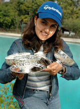 Irina Brar with the national trophies at the Chandigarh Golf Club on Monday