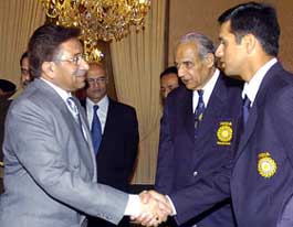 Indian cricket captain Rahul Dravid is greeted by Pakistan President Pervez Musharraf in Islamabad on Friday.