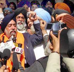Mr Paramjit Singh Sarna and his brother Mr Harvinder Singh Sarna address reporters after appearing at Akal Takht in Amritsar on Friday.
