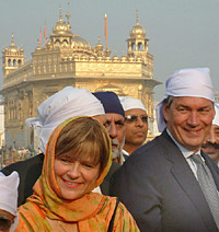 Mr Gary Doer, Premier of Manitoba, Canada, along with his wife at the Golden Temple, Amritsar, on Sunday