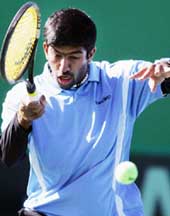 India�s Rohan Bopanna returns the ball to South Korea�s Lee Hyung-taik during the Davis Cup Asia-Oceania Group I in Changwon, South Korea, on Sunday. Bopanna lost 3-6, 1-6, 2-6.