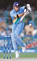 Sachin Tendulkar plays a stroke during the third one-day in Lahore on Monday