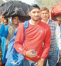 Cricket star Harbhajan Singh at the Wagah border after his return from Lahore on Tuesday.