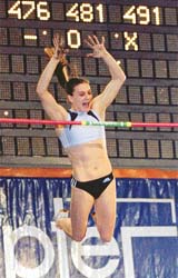 Russian Olympic champion Yelena Isinbayeva jumps to clear 4.91 metres, a new indoor pole vault world record, at the Pole Vault Stars event in the eastern Ukrainian city of Donesk