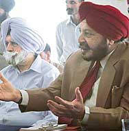 The DGP, Punjab, Mr S.S. Virk, and the former DGP, Punjab, Mr K.P.S. Gill, address a press conference in Chandigarh on Sunday.