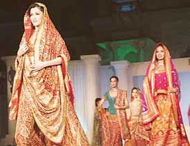 Models display Ritu Kumar�s collection at a fashion show held during the Heritage Festival in Patiala on Saturday.