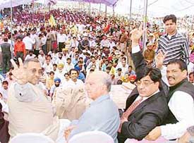 BJP leaders Shanta Kumar, Avinashi Rai Khanna and others show a victory sign during the party�s state rally held at Ludhiana on Sunday.