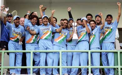Members of the Indian team celebrate after beating Pakistan in the fifth one-dayer in Karachi to clinch the Hutch Cup on Sunday