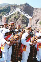 An Army band performs on the peace bridge after its inauguration at Kaman Post, 118 km from Srinagar