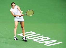 Elena Likhovtseva of Russia in action against Jelena Jankovic of Serbia and Montenegro during the Dubai Open on Monday. Likhovtseva won 7-5, 7-5. 