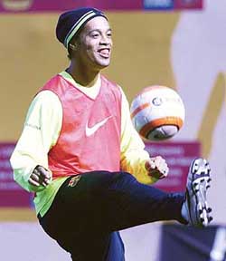 FC Barcelona�s soccer star Brazilian Ronaldinho attends a training session at Nou Camp stadium in Barcelona, Spain, on Monday. 