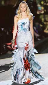 A model displays a creation by Italian designer Roberto Cavalli