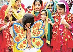 Students of Blossoms Senior Secondary School dressed up for giddha and fancy dress items at the Gymkhana Club in Patiala on Sunday.