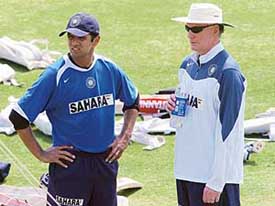 Rahul Dravid and Greg Chappell talk during a practice session at the VCA Cricket Ground in Nagpur on Tuesday on the eve of the first Test against England
