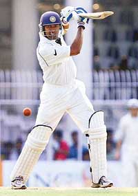Wasim Jaffer hits a boundary on the second day of the first Test against England in Nagpur on Thursday. 