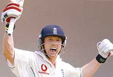 Paul Collingwood celebrates after scoring a century on the second day of the first Test in Nagpur on Thursday. 