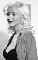 Singer Christina Aguilera poses at the launch of a music partnership between mobile phone service provider Orange and handset manufacturer Sony Ericsson in London on Friday.