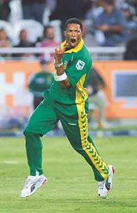 South African bowler Makhaya Ntini celebrates after taking the wicket of Australian batsman Michael Clarke during the second one-day international at Newlands, Cape