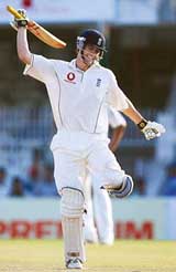 England�s Alastair Cook celebrates after scoring a century on his Test debut on the fourth day of the first Test against India at the VCA Cricket Ground 