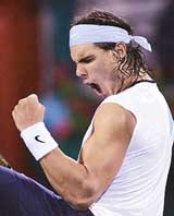 Rafael Nadal of Spain rejoices after beating Rainer Schuttler of Germany in the semifinal of the Dubai Open on Friday