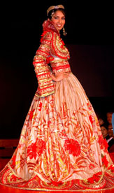 A model displays a creation by Indian designer Ritu Beri at a fashion show during the launch of her autobiography "Firefly" in New Delhi on Saturday night.