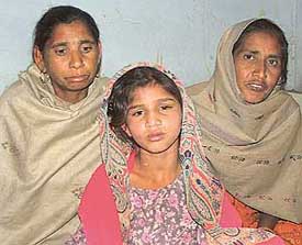 Prabhjit Kaur,  a resident of Ghanupur Kale, who was beaten by her employers, with her relatives at the Civil Hospital