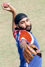 Monty Panesar bowls in the nets during a practise session in Mohali on Tuesday