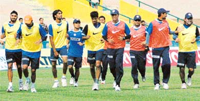 Indian cricketers run during a practise session at the PCA ground in Mohali on Tuesday