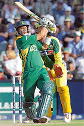 South Africa�s Herschelle Gibbs hits a four during the fifth one-dayer against Australia in Johannesburg on Sunday.