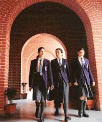 Students of Sri Dasmesh Academy walk through the portals of their institute in Anandpur Sahib